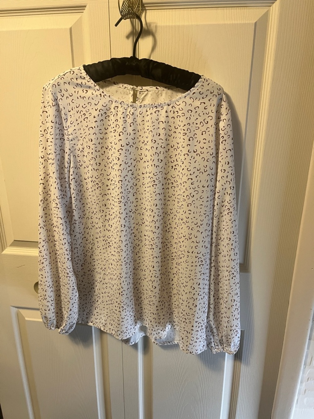 Printed Light Pink Long-Sleeve Blouse with Subtle Dot Motif
